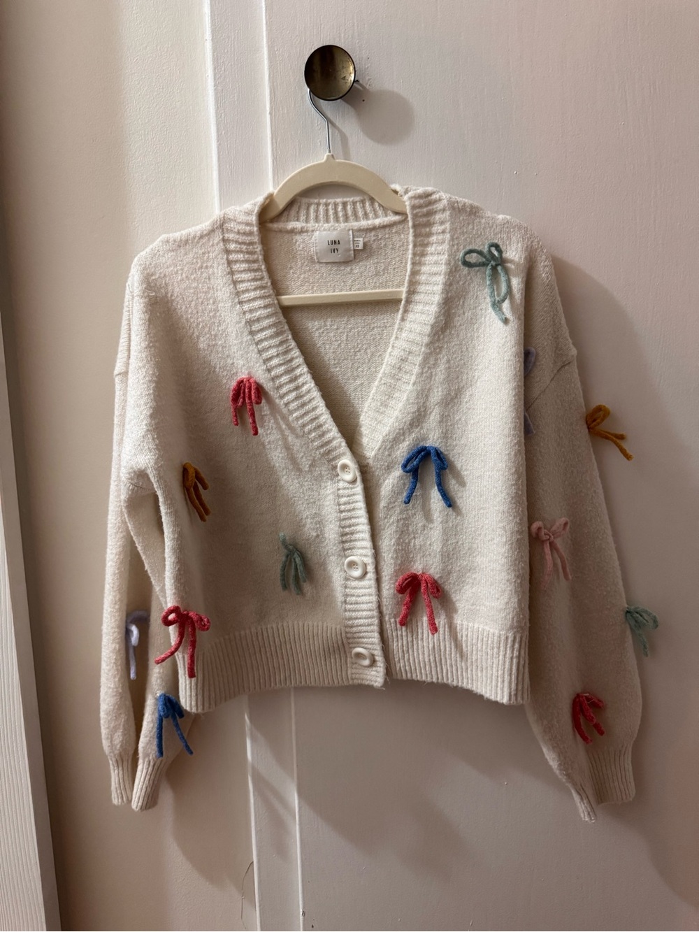 Cream Bow-Appliqué V-Neck Button Cardigan